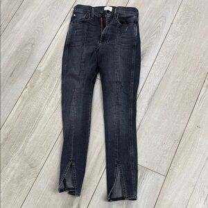 Alice and Olivia high waisted black jean with slits on the bottoms. Very cool